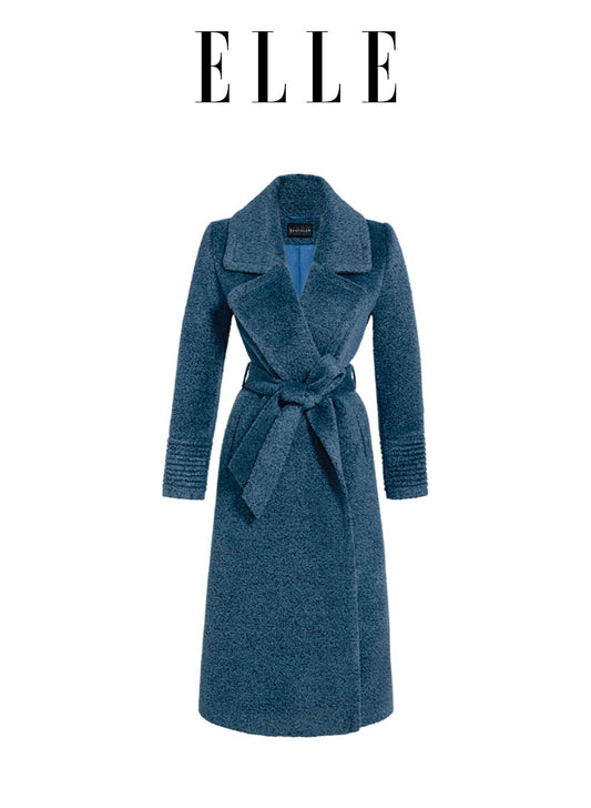 Image features the Elle logo and an off-figure image of the Sentaler Bouclé Alpaca Long Notched Collar Wrap Coat featured in Bouclé Alpaca and available in Lazuli Blue.
