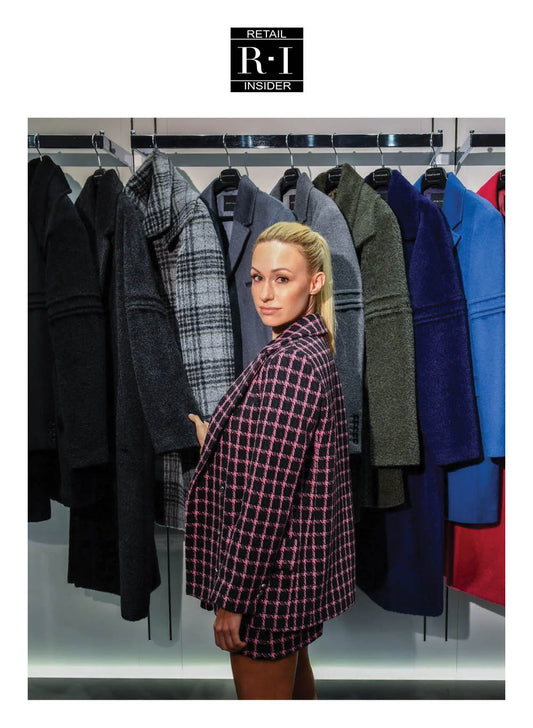 Image features the Retailer Insider logo and an image of designer, founder, president and creative director of SENTALER, Bojana Sentaler standing in front of the new Men's Fall/Winter 2021/22 collection.