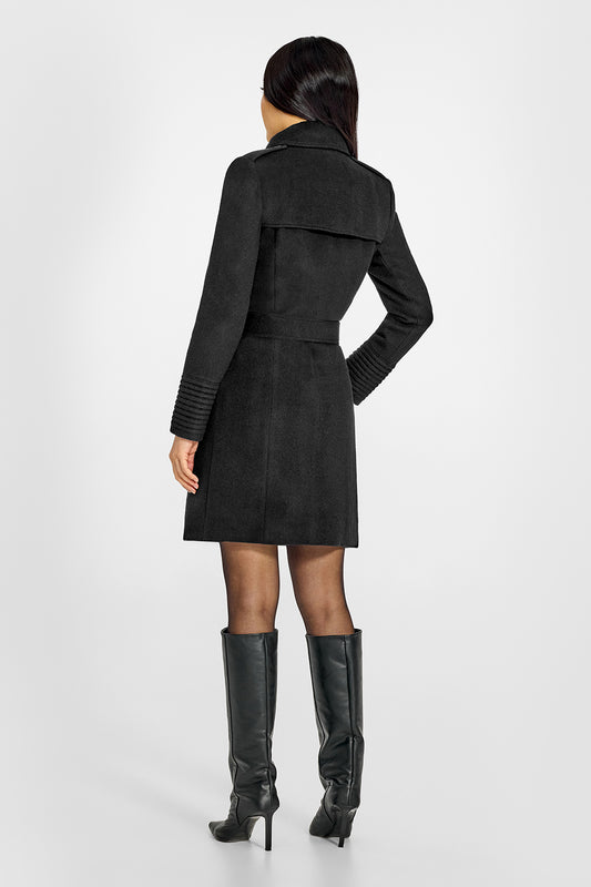 Sentaler Mid Length Trench Black Coat in Baby Alpaca wool. Seen from side belted on female model.