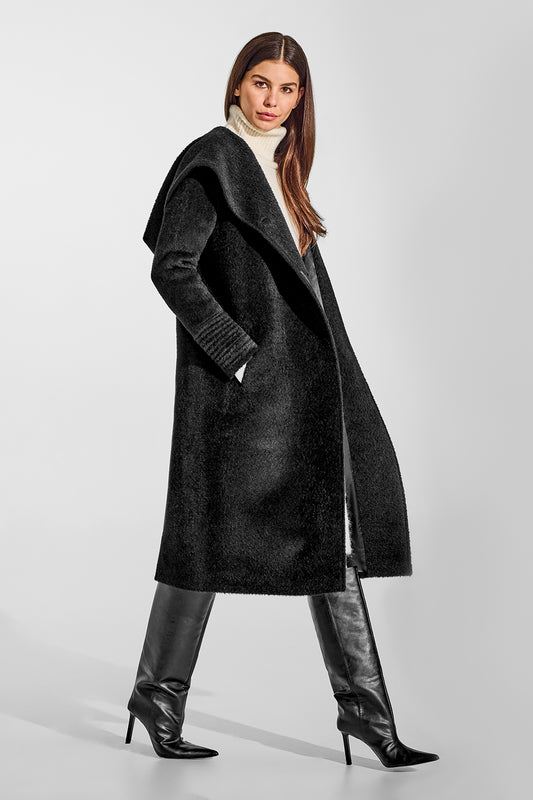 Sentaler Bouclé Alpaca Long Hooded Black Coat in Bouclé Alpaca wool. Seen from side open on female model.