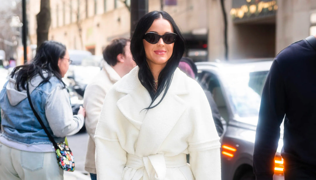 American singer, songwriter and television personality Katy Perry is wearing the SENTALER Men Technical Bouclé Alpaca Robe Coat in Ivory White walking in the streets of New York.