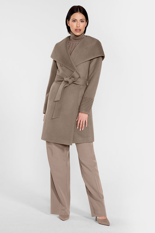 Sentaler Mid Length Hooded Wrap Coat featured in Baby Alpaca and available in Warm Taupe. Seen from front on female model who is wearing the coat belted.