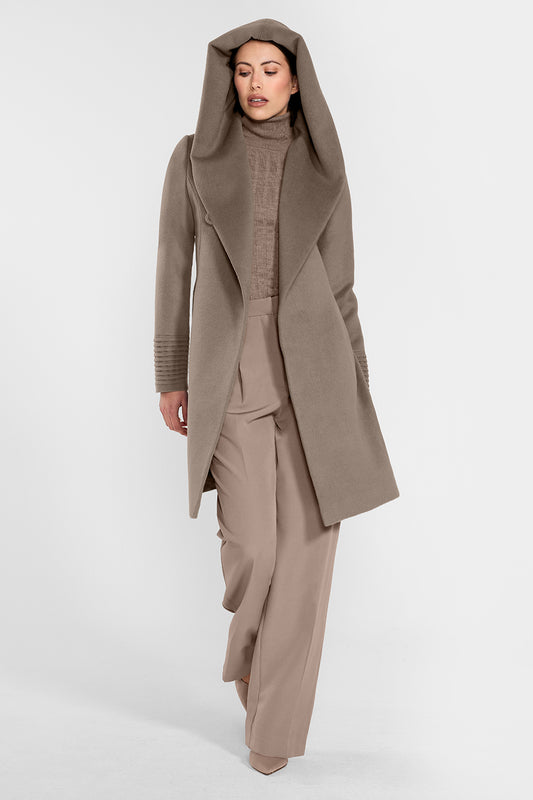 Sentaler Mid Length Hooded Wrap Coat featured in Baby Alpaca and available in Warm Taupe. Seen from front on female model who is wearing the coat open with hood.