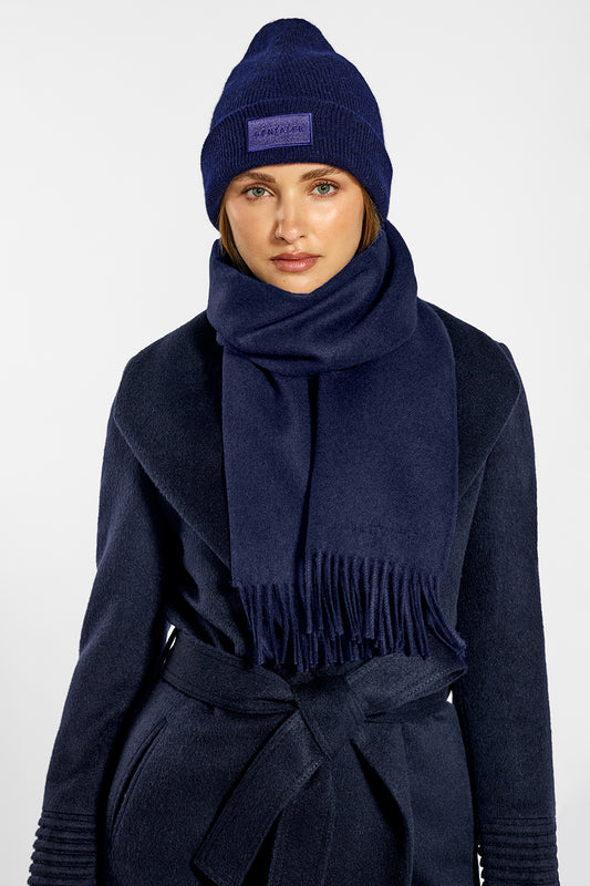 Sentaler Alpaca Beanie and Mid Length Shawl Collar Wrap Coat crafted in Baby Alpaca wool and in Navy. Seen from front  on female model.
