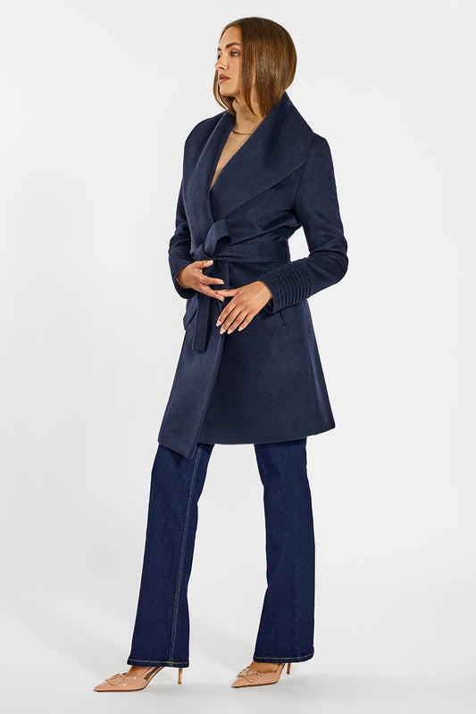 Sentaler Mid Length Shawl Collar Wrap Coat crafted in Baby Alpaca wool and in Deep Navy. Seen from side on female model.