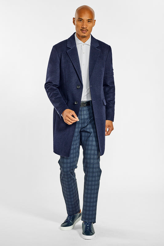 Sentaler Technical Baby Alpaca Notched Lapel Overcoat crafted in Technical Baby Alpaca and available in Deep Navy. Seen from front open on male model.