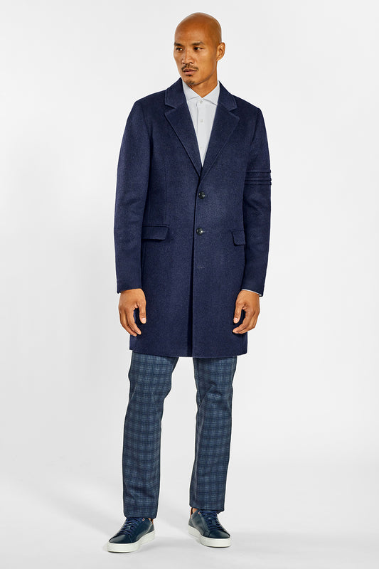 Sentaler Technical Baby Alpaca Notched Lapel Overcoat crafted in Technical Baby Alpaca and available in Deep Navy. Seen from front on male model.