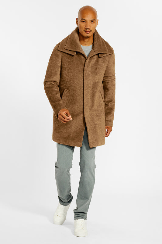 Sentaler Technical Bouclé Alpaca Double Collar Topcoat crafted in Technical Bouclé Alpaca and available in Dark Camel. Seen from front on male model.