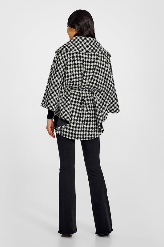 Sentaler Tweed Black and White Houndstooth Cape in Tweed Suri Alpaca wool. Seen from back belted on female model.