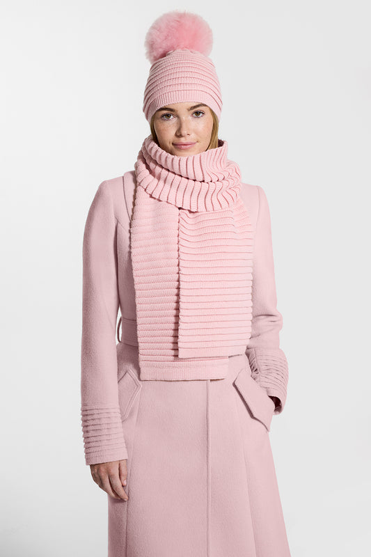 Sentaler Kids (1-5 Years) Ribbed Hat with Oversized Fur Pompon and Ribbed Scarf featured in Baby Alpaca and available in Pink. Seen from front on model.