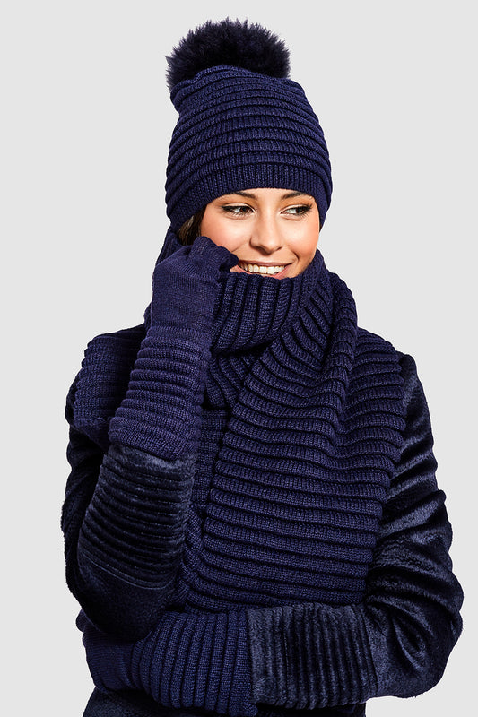 Sentaler Adult Ribbed Hat With Oversized Fur Pompon featured in Baby Alpaca and available in Navy. Seen with scarf and gloves 2.