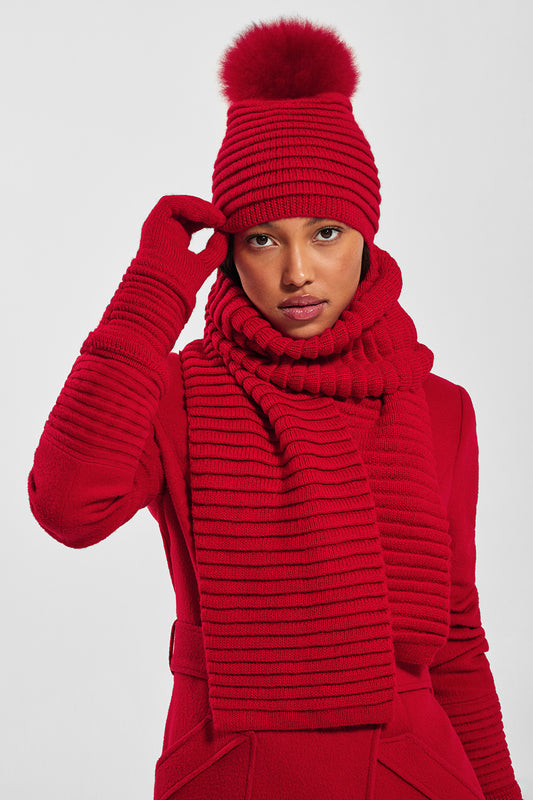 Sentaler Adult Ribbed Hat With Oversized Fur Pompon featured in Baby Alpaca and available in Red. Seen with scarf and gloves from front 1.