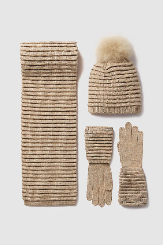 Sentaler Adult Ribbed Scarf, Ribbed Hat with Oversized Fur Pompon featured in Baby Alpaca and available in Camel. Seen as off figures.