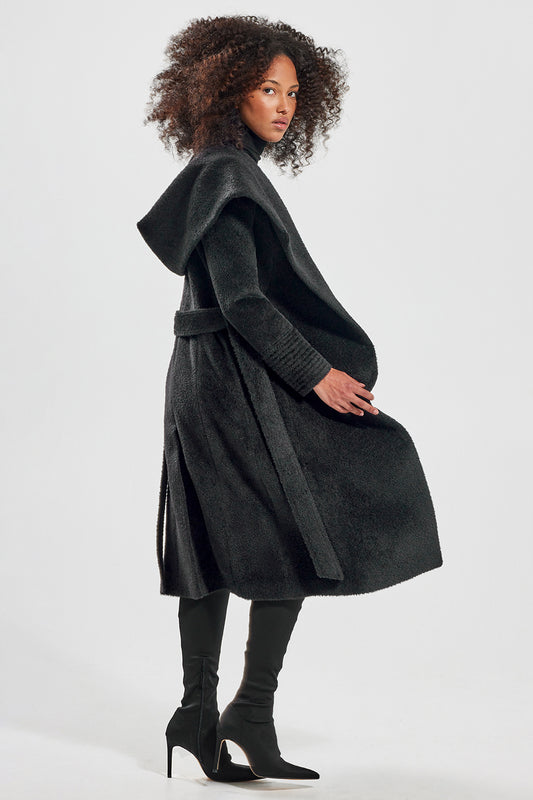 Sentaler Bouclé Alpaca Long Hooded Wrap Coat featured in Bouclé Alpaca and available in Black. Seen from side open on model.