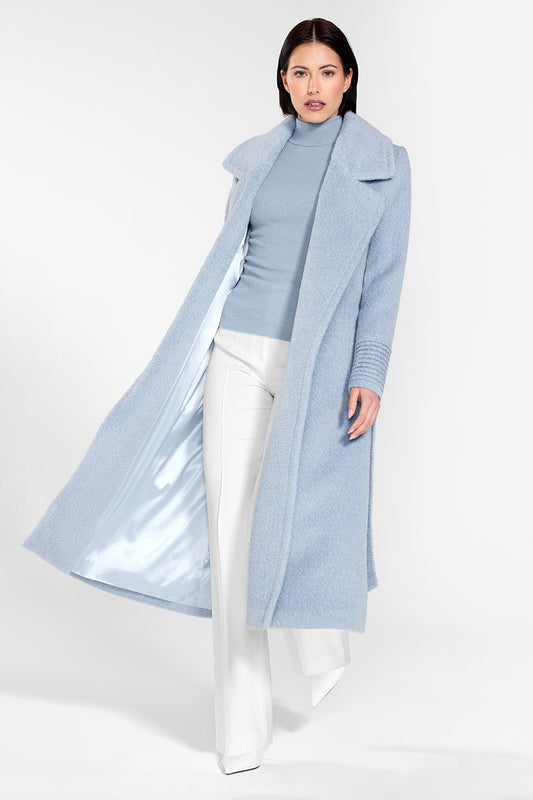 Sentaler Bouclé Alpaca Long Notched Collar Wrap Coat featured in Bouclé Alpaca and available in Powder Blue. Seen from front on female model wearing the coat open while walking forward.