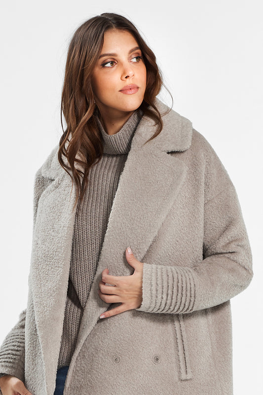 Sentaler Bouclé Alpaca Mid Length Oversized Notched Collar Coat featured in Bouclé Alpaca and available in Sand. Seen close up.
