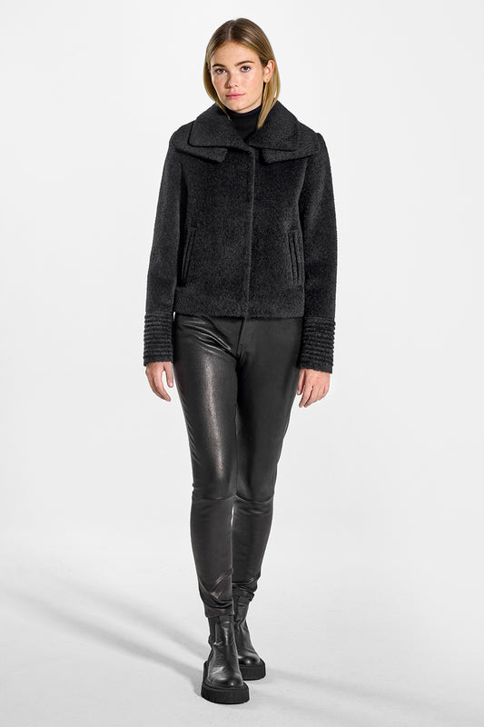 Sentaler Bouclé Alpaca Moto Jacket with Signature Double Collar featured in Bouclé Alpaca and available in Black. Seen from front on model.