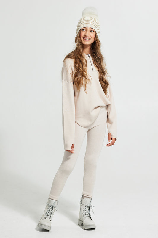 Sentaler Kids (6-14 Years) Ribbed Hat with Oversized Fur Pompon featured in Baby Alpaca and available in Ivory. Seen from front.