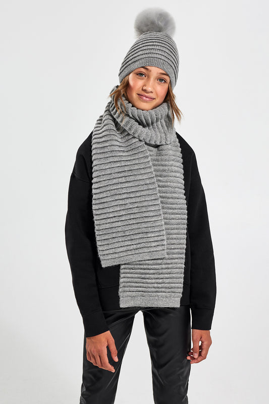 Sentaler Kids (6-14 Years) Ribbed Scarf featured in Baby Alpaca and available in Grey. Seen from front above the knee.
