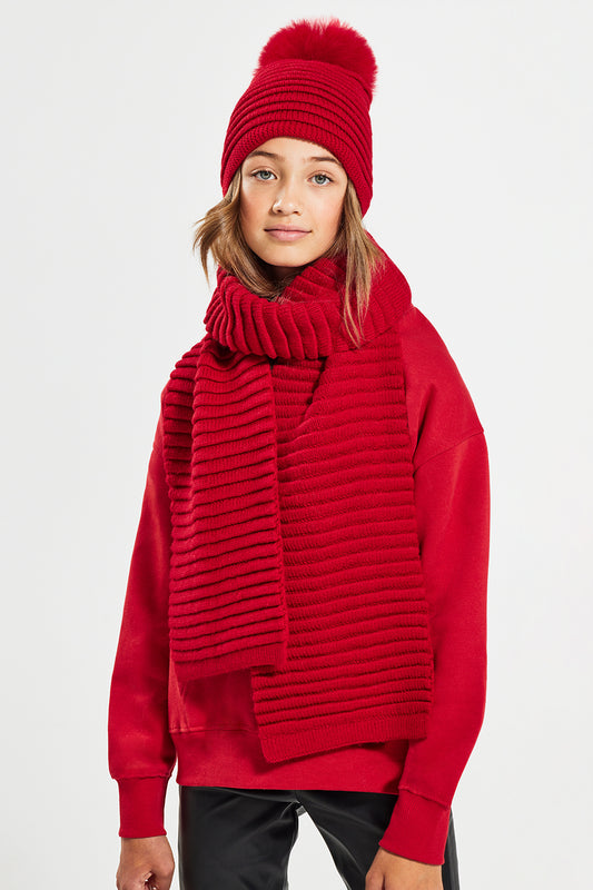 Sentaler Kids (6-14 Years) Ribbed Scarf featured in Baby Alpaca and available in Red. Seen from front above the knee.