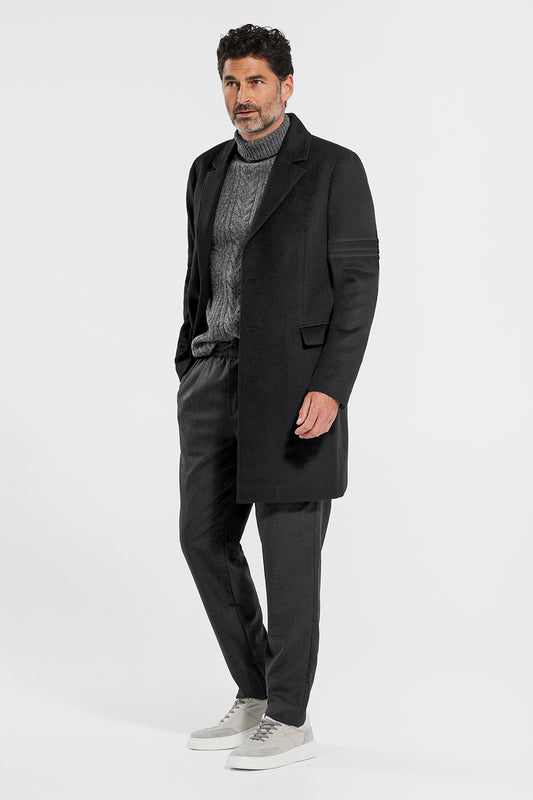 Sentaler Technical Baby Alpaca Notched Lapel Overcoat featured in Technical Baby Alpaca and available in Black. Seen from side open on model.