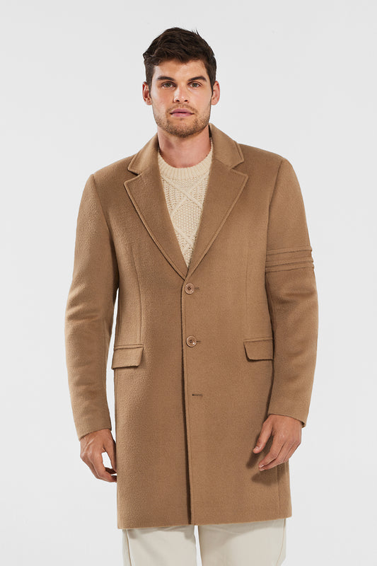 Sentaler Technical Baby Alpaca Notched Lapel Overcoat featured in Technical Baby Alpaca and available in Dark Camel. Seen from front above the knee.